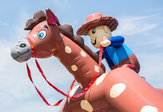 Groot overdekt luchtkussen kopen in thema cowboy western voor kinderen. Koop luchtkussens online bij JB Inflatables Nederland 