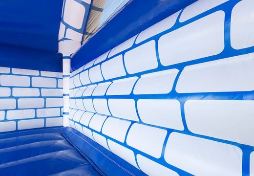 Groot overdekt blauw wit springkussen kopen in thema kasteel voor kinderen. Koop springkussens online bij JB Inflatables Nederland 