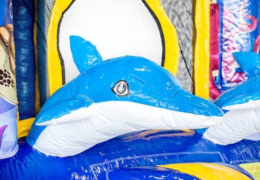 Koop mini opblaasbare multiplay springkussen in dolfijn thema met glijbaan voor kinderen. Bestel opblaasbare springkussens online bij JB Inflatables Nederland