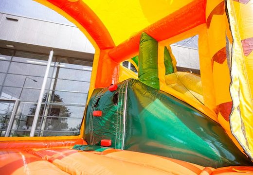 Springkussen in theme jungle met een glijbaan kopen voor kinderen. Bestel opblaasbare springkussens online bij JB Inflatables Nederland