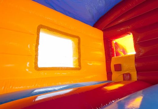 Opblaasbaar overdekt maxi multifun springkussen in clown thema met glijbaan voor kids kopen. Bestel springkussens online bij JB Inflatables Nederland