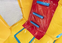 Bestel opblaasbaar springkussen met glijbaan in het geel met emoji's erop voor kinderen