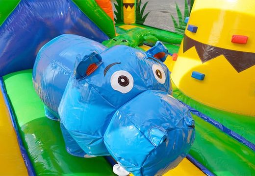 Indoor jungle springkussen met een glijbaan bestellen voor kinderen. Koop springkussens online bij JB Inflatables Nederland