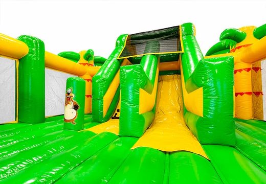 Bestel een slidebox luchtkussen in thema Jungle met een glijbaan voor kinderen. Koop luchtkussens online bij JB Inflatables Nederland