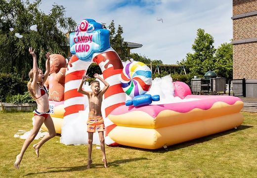 Opblaasbaar open bubble boarding park springkussen met schuim kopen in thema candyland snoep lollipop voor kids