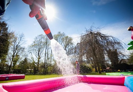 Multiplay splashy slide Flamingo springkussen kopen voor kids bij JB Inflatables Nederland. Bestel springkussens online bij JB Inflatables Nederland