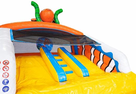 Waterglijbaan springkasteel in seaworld thema met bovenop een 3D object van nemo  bestellen bij JB Inflatables Nederland. Koop nu springkastelen online bij JB Inflatables Nederland 