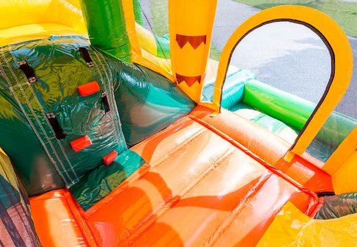 Jumpy Fun Jungle springkussen met een glijbaan bestellen voor kinderen. Koop opblaasbare springkussens online bij JB Inflatables Nederland