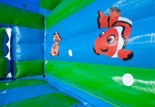 Overdekt multifun springkussen met glijbaan in thema turtle met 3D object aan de bovenkant bestellen voor kids. Koop springkussens online bij JB Inflatables Nederland