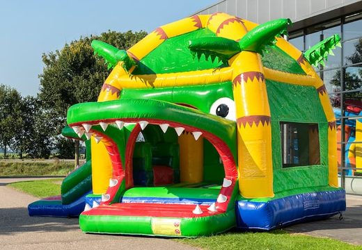 Multifun super krokodil springkussen met glijbaan bestellen voor kids. Koop springkussens online bij JB Inflatables Nederland