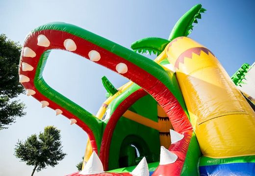 Multifun super krokodil springkussen met glijbaan kopen voor kinderen. Koop springkussens online bij JB Inflatables Nederland