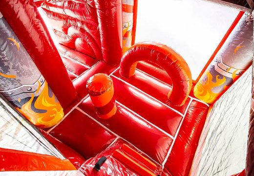 Springkasteel in brandweer thema met een glijbaan bestellen voor kinderen. Koop opblaasbare springkastelen online bij JB Inflatables Nederland