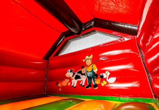 Koop opblaasbare slide combo boerderij springkasteel voor kinderen. Bestel opblaasbare springkastelen met glijbaan bij JB Inflatables Nederland