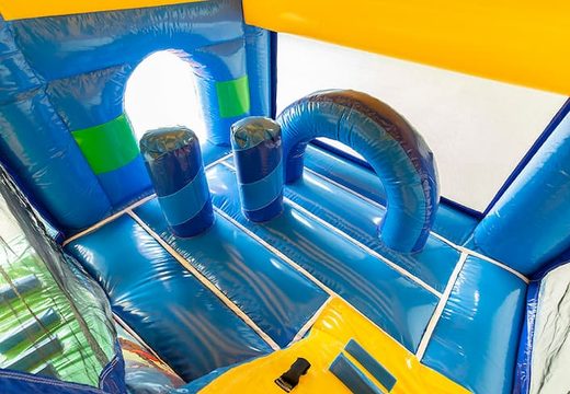Springkasteel in seaworld thema met een glijbaan bestellen voor kinderen. Koop opblaasbare springkastelen online bij JB Inflatables Nederland