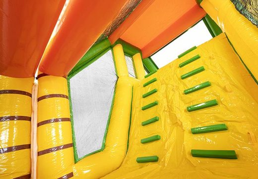 Opblaasbare modulaire stormbaan in jungle thema met passende 3D objecten bestellen voor kinderen. Koop opblaasbare stormbanen nu online bij JB Inflatables Nederland