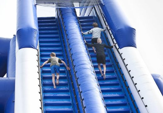 Bestel een perfecte opblaasbare monsterslide 11meter hoog en 53 meter lang met een dubbele trap voor kinderen. Koop opblaasbare glijbanen nu online bij JB Inflatables Nederland