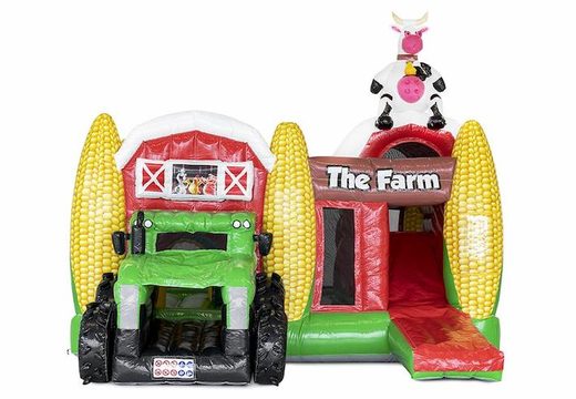 Opblaasbaar springkussen met glijbaan in boerderij thema met glijbaan in vorm van tractor kopen