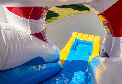 Inflatable luchtkussen met spring gedeelte en glijbaan in rubber eend thema te koop voor kinderen